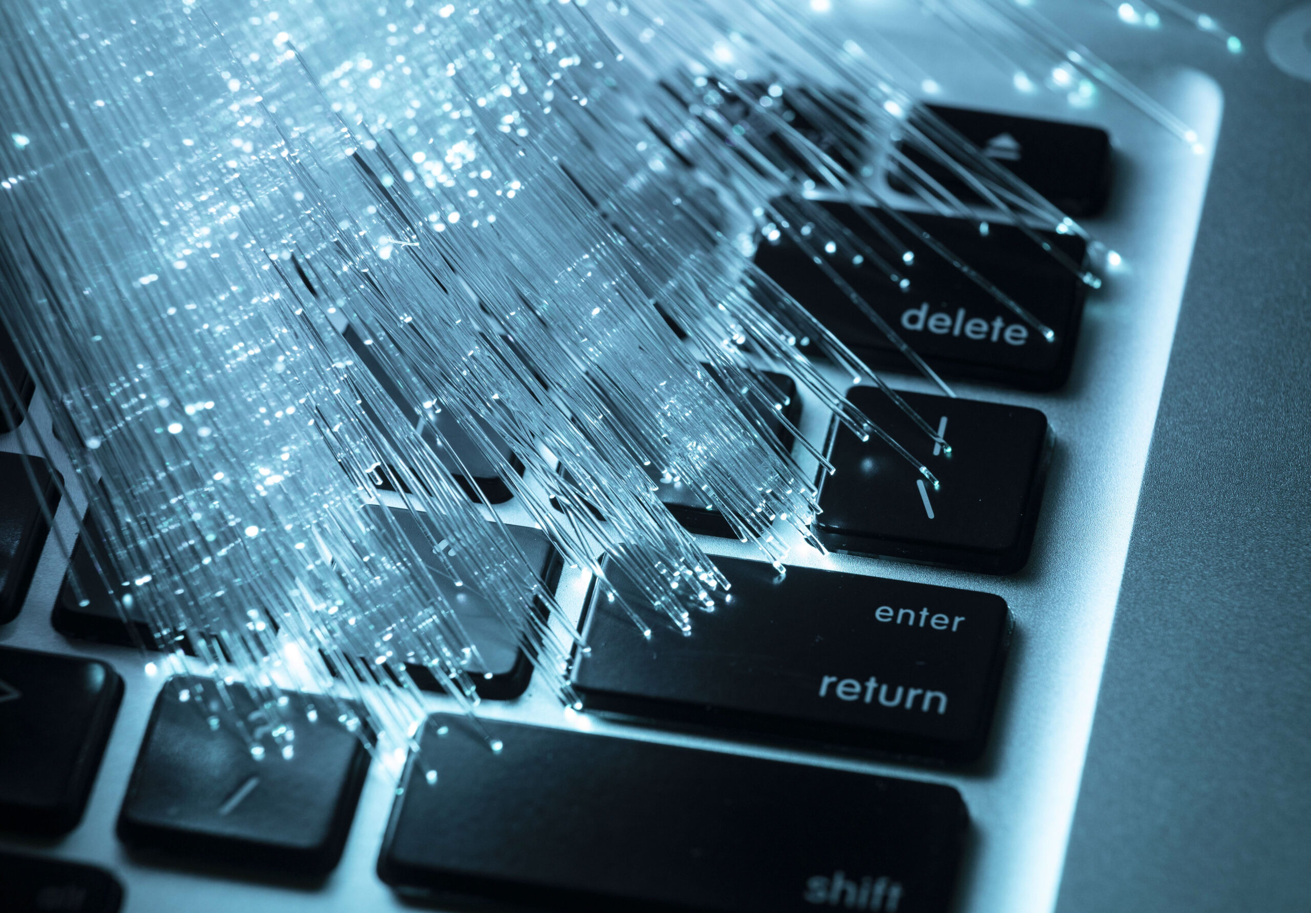 Glowing abstract light over workspace.